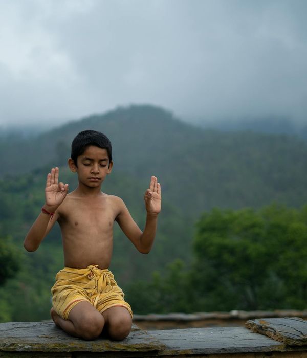 A serene woman practicing mindful breathing in a calm environment.